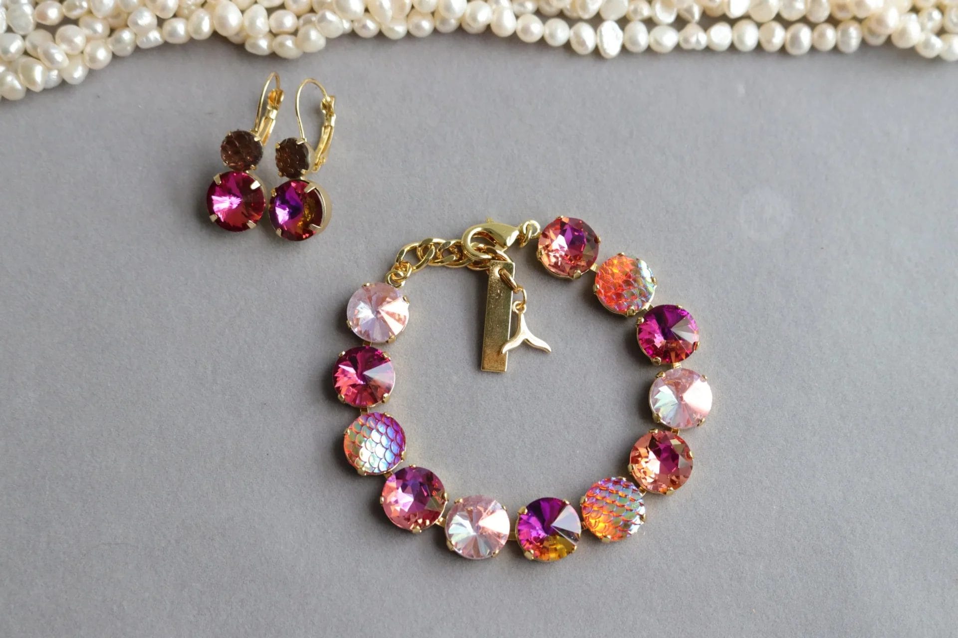 pink peach dark mermaid bracelet and earrings