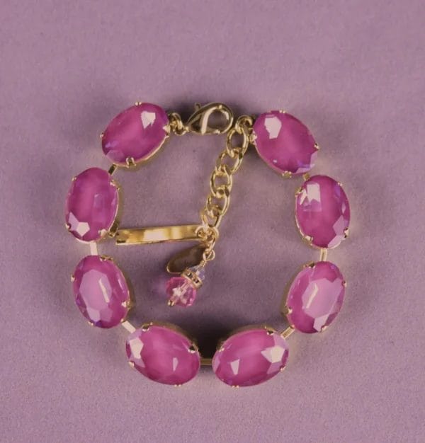purple bracelet and earrings