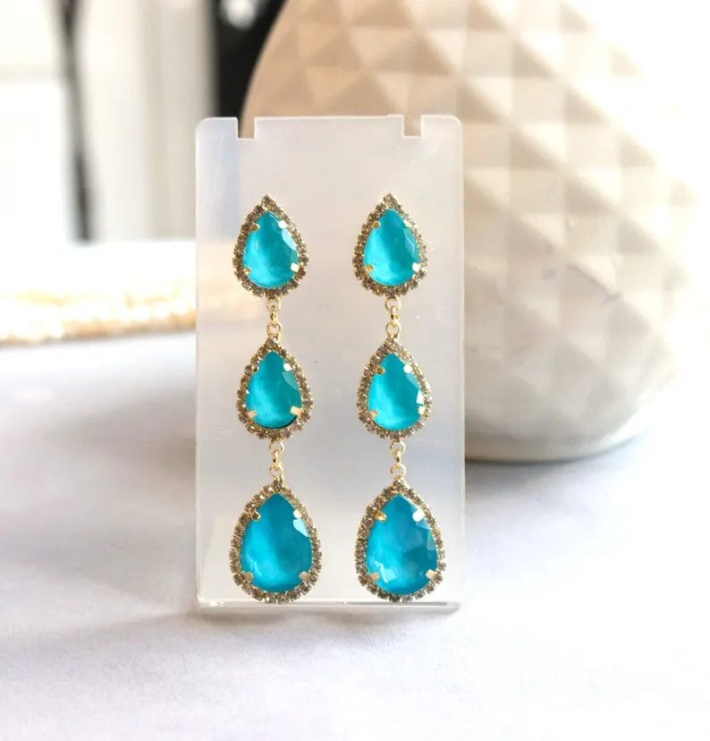 Turquoise and neon aqua blue teardrop earrings with clear rhinestone halo set in gold or silver tone metal, perfect for bridal, prom, or beach events.