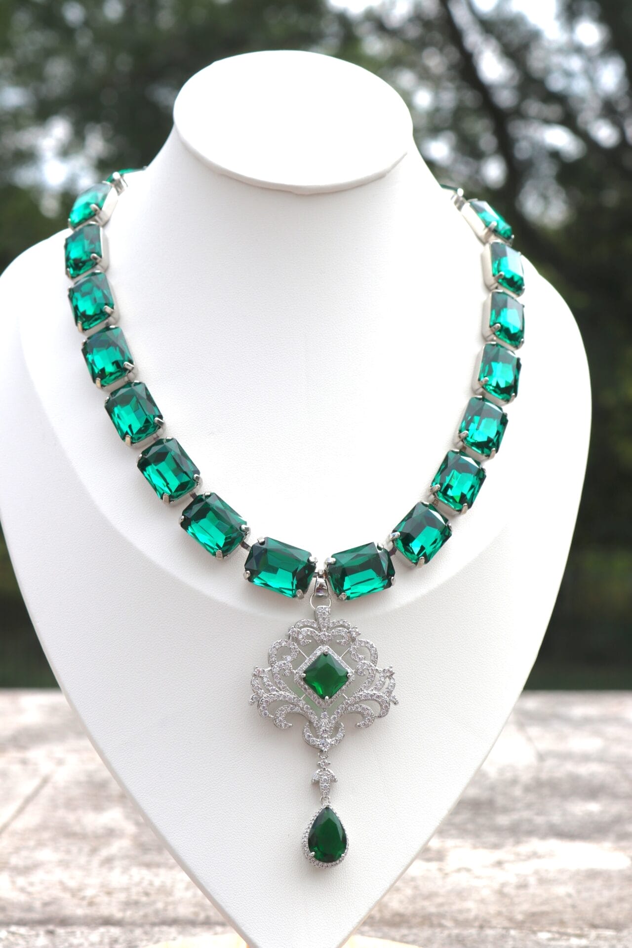 Emerald green statement necklace with octagon-cut crystals and pendant